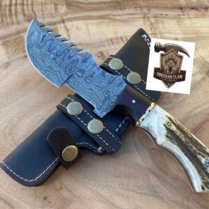 Unique Handmade Damascus Steel Blade Tracker Knife With Unique Stag Handle and leather sheath.
