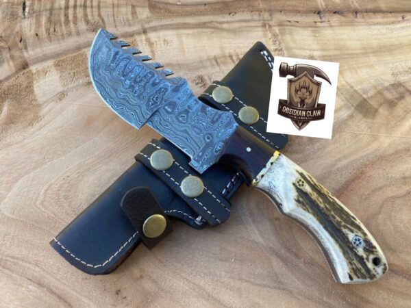 Unique Handmade Damascus Steel Blade "11"Tracker Knife With Unique Stag Handle and leather sheath. 

Overall length: 11 inches. 

Handle Length: "5"

Blade Length: "6" - Image 3