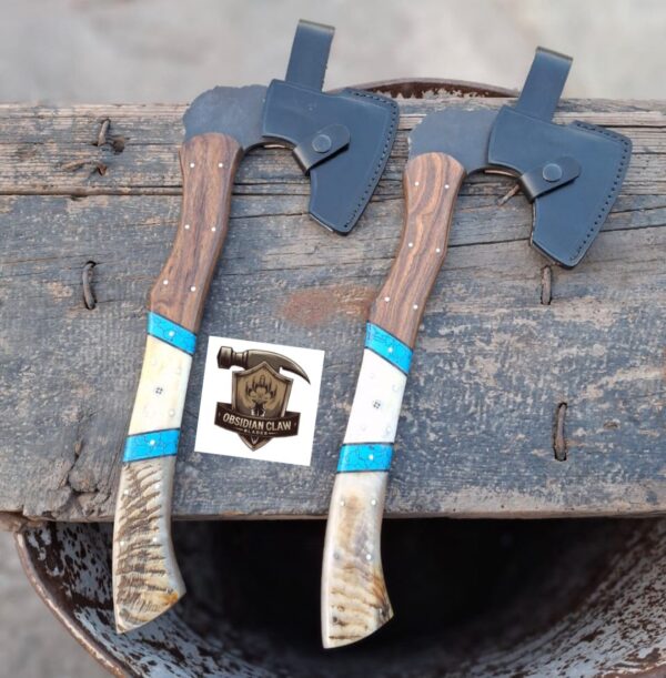 Lot of "2" Handmade 1095 high carbon steel vikings  throwing hatchet  with leather cover. 
Handle made with the combination  of ram horn and camel bone and rose wood scales . Blue Turkish spacers.  Approximately  17 inches long.
6 inches head width. - Image 4