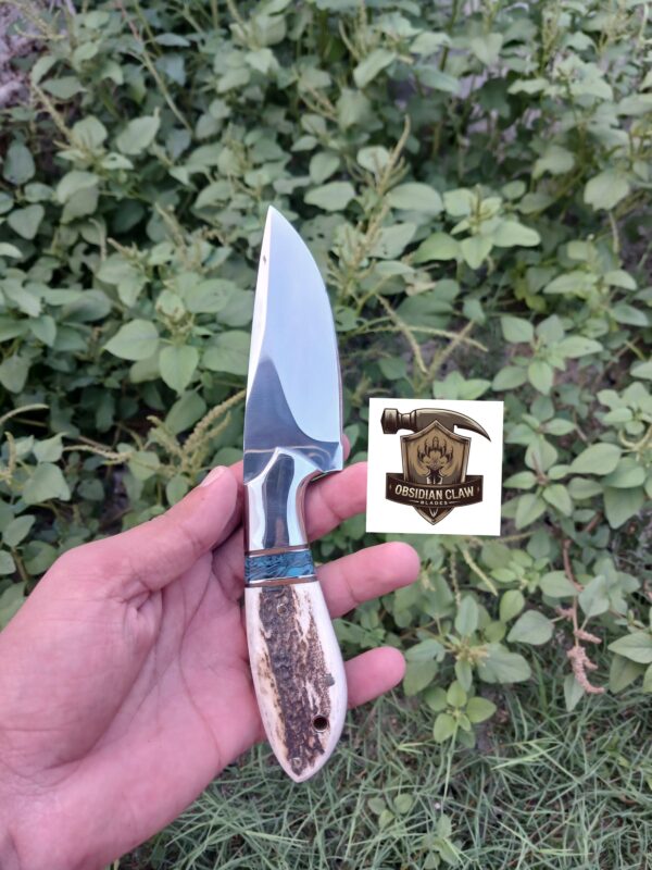 Custome Handmade high carbon D2 steel Skinner knife with leather sheath.  

Overall length  : 8 inches. 
Blade Length  : 4 inches. 
Handle Length  : 4 inches.