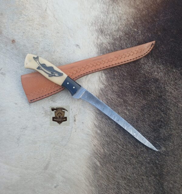 Damascus steel Fishing Fillet knife with leather sheath.