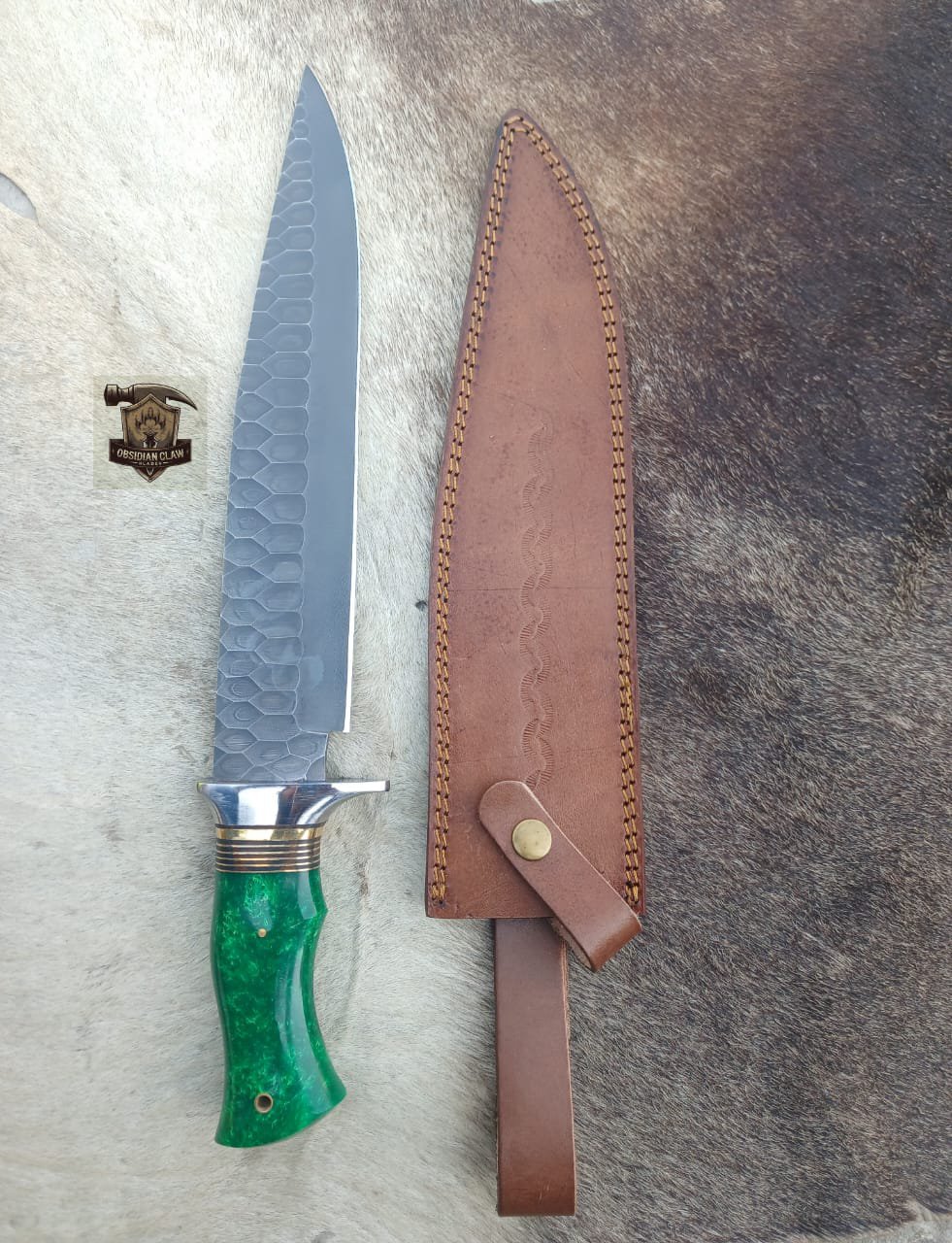 Handmade Forged Bowie knife with leather sheath.