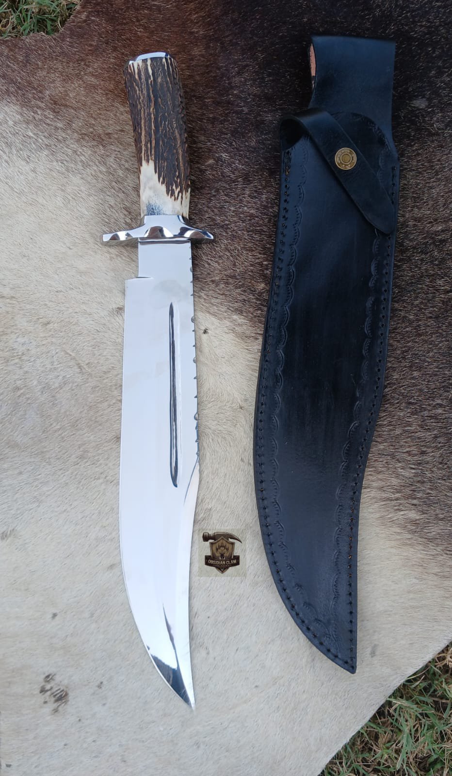 J2 Steel high polished mirror Bowie knife with leather sheath.