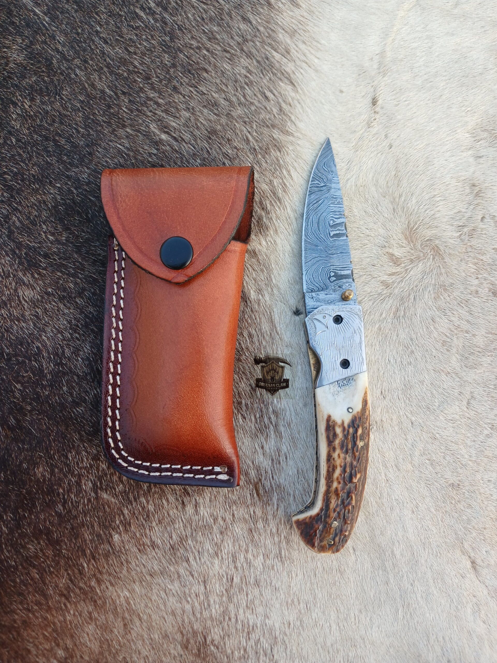 Handmade Damascus Folding Knife with Leather Sheath.