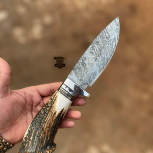 Custome handmade Damascus steel knife with leather cover.