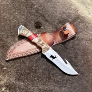 Gut hook knife with Leather sheath.