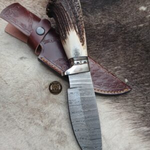 Custome handmade Damascus steel knife with leather cover.