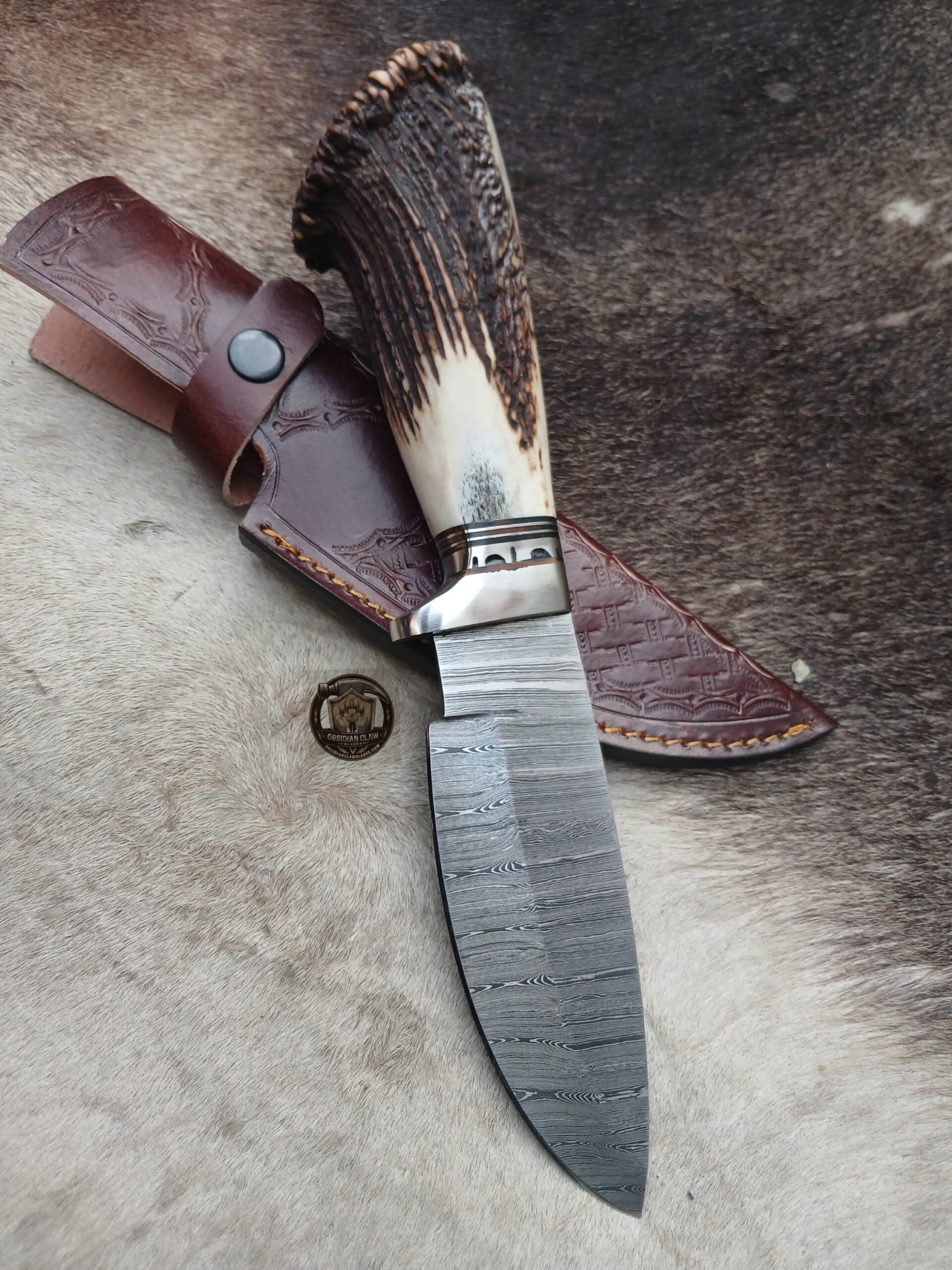 Custome handmade Damascus steel knife with leather cover.