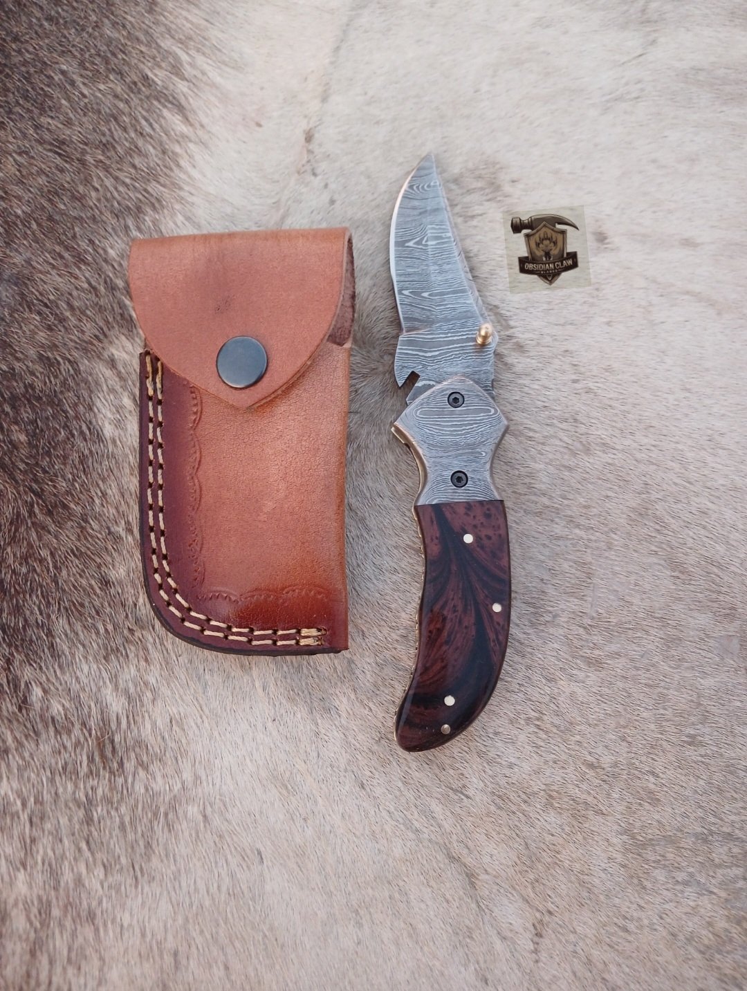 Linear folding knife with Leather cover.