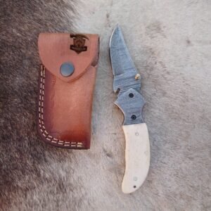 Linear Folding knife with Leather cover.