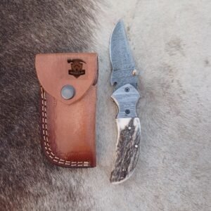 Damascus steel Linear folding knife with Leather cover.